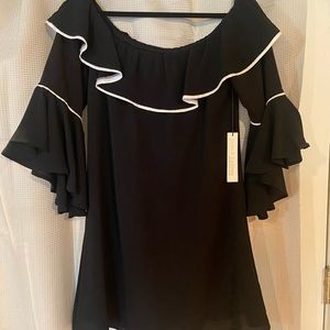 A line midi dress. Black with white piping